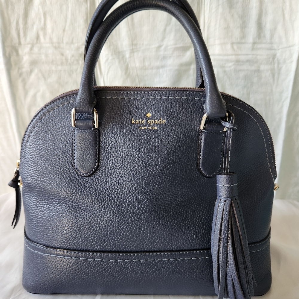 Kate Spade New York blue leather satchel bag.